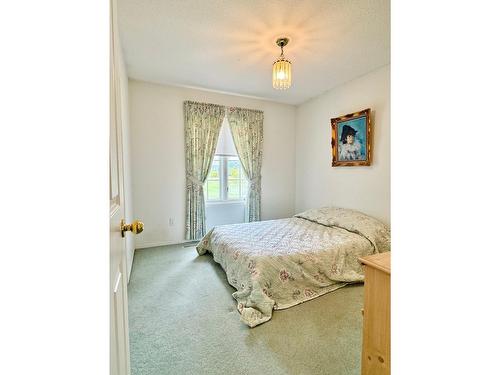 2411 2Nd Street N, Cranbrook, BC - Indoor Photo Showing Bedroom