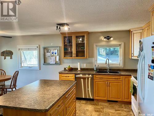 104 3Rd Street E, Choiceland, SK - Indoor Photo Showing Kitchen With Double Sink