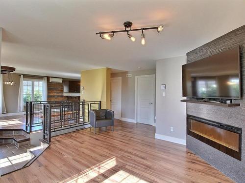 Overall view - 262 Sent. Des Fougères, Val-D'Or, QC - Indoor Photo Showing Living Room With Fireplace