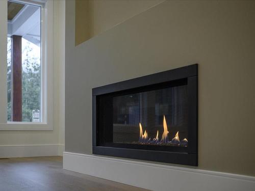 135 Bray Rd, Nanaimo, BC - Indoor Photo Showing Other Room With Fireplace