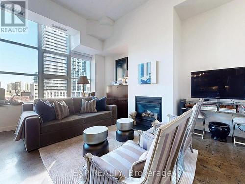 747 - 155 Dalhousie Street, Toronto, ON - Indoor Photo Showing Living Room With Fireplace