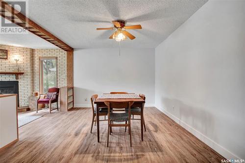 2530 Cumberland Avenue S, Saskatoon, SK - Indoor Photo Showing Dining Room With Fireplace