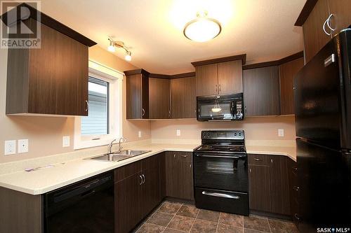 4608 James Hill Road, Regina, SK - Indoor Photo Showing Kitchen With Double Sink