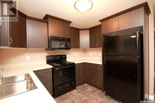 4608 James Hill Road, Regina, SK - Indoor Photo Showing Kitchen With Double Sink