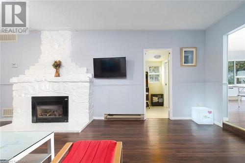 629 Lakelands Avenue, Innisfil, ON - Indoor Photo Showing Living Room With Fireplace