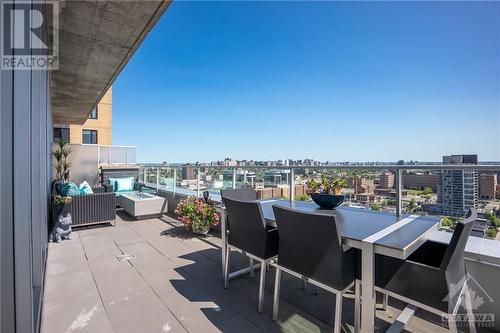 East-facing patio with more lake views as well as views of the city skyline. Another natural gas hook up here, ideal for a gas fire pit to cozy around on the chillier summer evenings. - 111 Champagne Avenue S Unit#2004, Ottawa, ON - Outdoor
