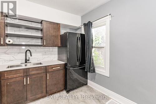 140 Gage Avenue N, Hamilton, ON - Indoor Photo Showing Kitchen With Double Sink
