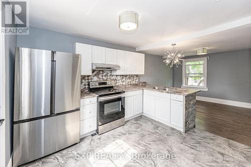 140 Gage Avenue N, Hamilton, ON - Indoor Photo Showing Kitchen With Double Sink