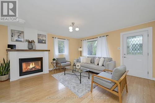 14 Millwood Road, Erin, ON - Indoor Photo Showing Living Room With Fireplace