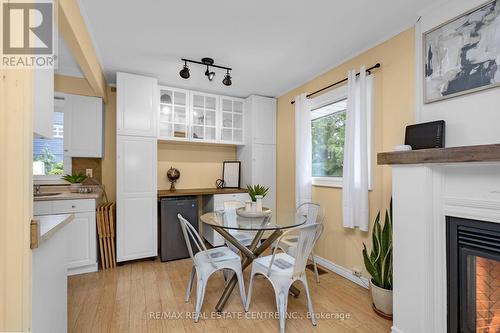 14 Millwood Road, Erin, ON - Indoor Photo Showing Dining Room With Fireplace