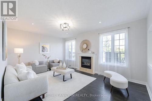 33 Rubysilver Drive, Brampton, ON - Indoor Photo Showing Living Room With Fireplace
