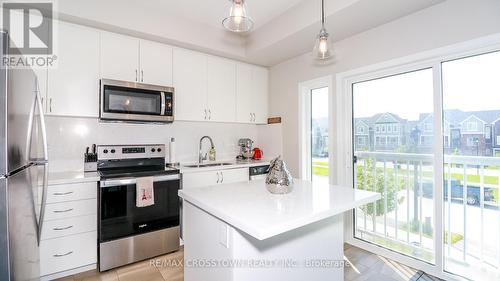11 Shelburne Avenue, Wasaga Beach, ON - Indoor Photo Showing Kitchen With Upgraded Kitchen