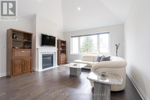 13 Fawndale Crescent, Wasaga Beach, ON - Indoor Photo Showing Living Room With Fireplace