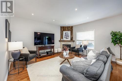 24 Montague Avenue, Clarington, ON - Indoor Photo Showing Living Room With Fireplace