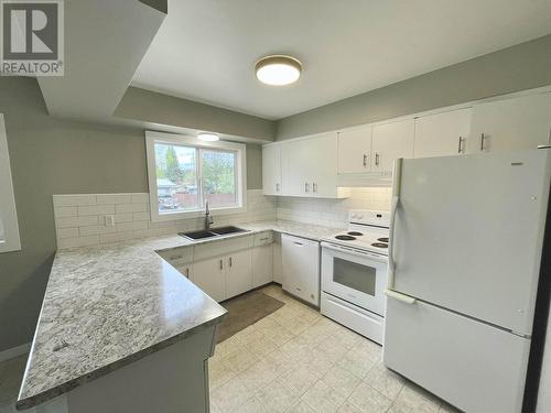 210 S Lyon Street, Prince George, BC - Indoor Photo Showing Kitchen With Double Sink