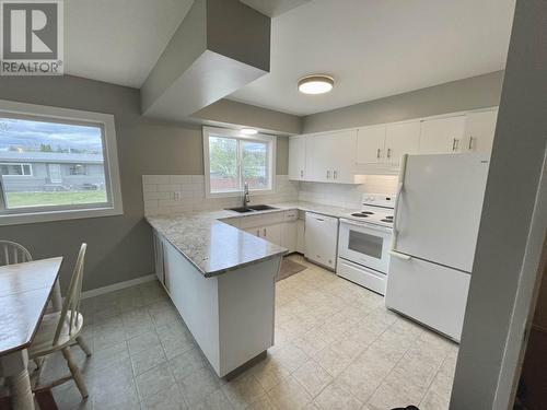 210 S Lyon Street, Prince George, BC - Indoor Photo Showing Kitchen With Double Sink