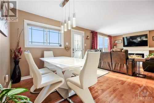 47 Tauvette Street, Ottawa, ON - Indoor Photo Showing Dining Room With Fireplace