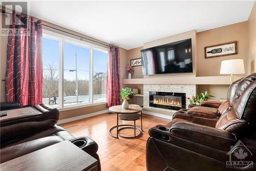 47 Tauvette Street, Ottawa, ON - Indoor Photo Showing Living Room With Fireplace