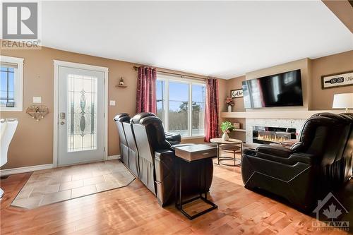 47 Tauvette Street, Ottawa, ON - Indoor Photo Showing Living Room With Fireplace