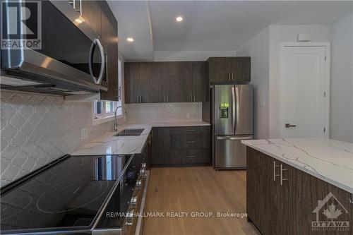 810 Star, Ottawa, ON - Indoor Photo Showing Kitchen With Double Sink