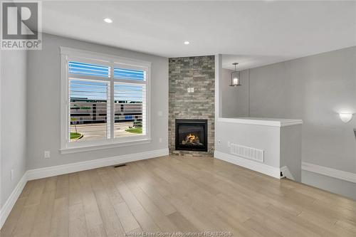 729 Brownstone Drive, Lakeshore, ON - Indoor Photo Showing Living Room With Fireplace