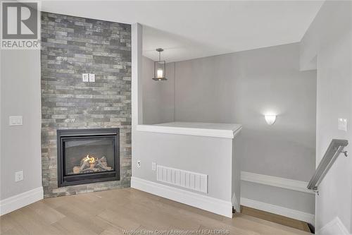 729 Brownstone Drive, Lakeshore, ON - Indoor Photo Showing Living Room With Fireplace