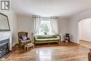 12 Glenellen Drive W, Toronto, ON  - Indoor Photo Showing Living Room With Fireplace 