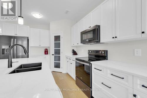 18 Athabaska Drive, Belleville, ON - Indoor Photo Showing Kitchen With Double Sink