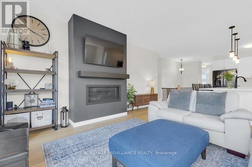 18 Athabaska Drive, Belleville, ON - Indoor Photo Showing Living Room With Fireplace