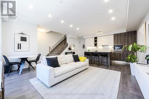 12 - 66 Long Branch Avenue, Toronto, ON - Indoor Photo Showing Living Room