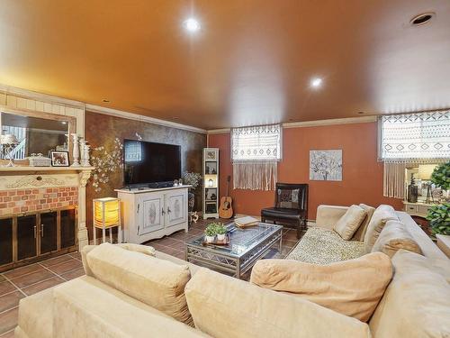 Family room - 984 Rue De Neubois, Repentigny (Repentigny), QC - Indoor Photo Showing Living Room With Fireplace