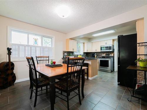 4116 Orchard Cir, Nanaimo, BC - Indoor Photo Showing Other Room With Fireplace