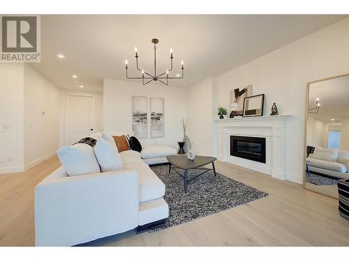 4956 Bucktail Lane, Kelowna, BC - Indoor Photo Showing Living Room With Fireplace