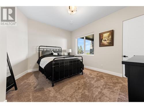 5650 The Edge Place Unit# 105, Kelowna, BC - Indoor Photo Showing Bedroom