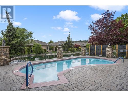 595 Yates Road Unit# 415, Kelowna, BC - Outdoor With In Ground Pool With Deck Patio Veranda With Backyard