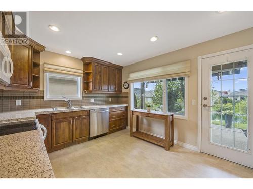 595 Yates Road Unit# 415, Kelowna, BC - Indoor Photo Showing Kitchen With Double Sink