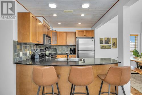 6952 Terazona Drive Unit# 408, Kelowna, BC - Indoor Photo Showing Kitchen With Double Sink