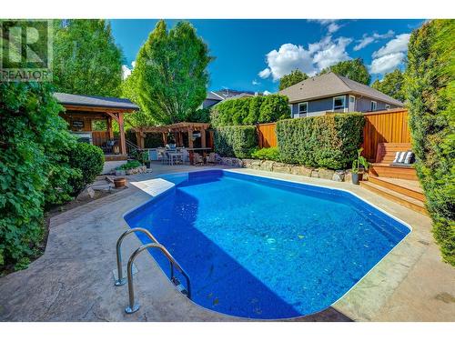 306 Yates Road, Kelowna, BC - Outdoor With In Ground Pool With Deck Patio Veranda With Backyard