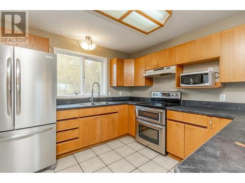 4661 June Springs Road, Kelowna, BC - Indoor Photo Showing Kitchen With Double Sink