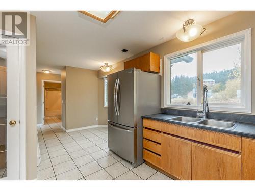 4661 June Springs Road, Kelowna, BC - Indoor Photo Showing Kitchen With Double Sink