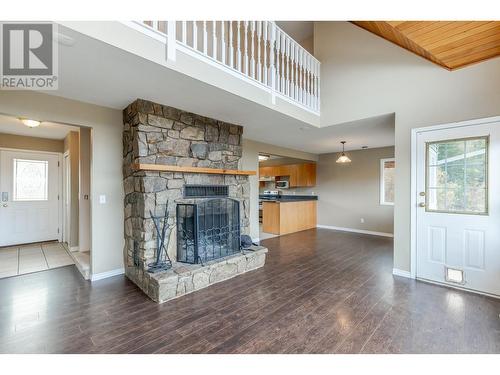 4661 June Springs Road, Kelowna, BC - Indoor Photo Showing Other Room With Fireplace