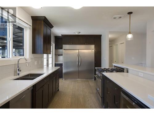 1535 Crawford Road Lot# 122, Kelowna, BC - Indoor Photo Showing Kitchen With Double Sink With Upgraded Kitchen