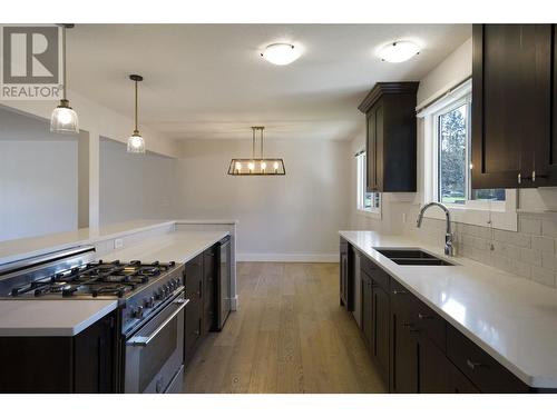 1535 Crawford Road Lot# 122, Kelowna, BC - Indoor Photo Showing Kitchen With Double Sink With Upgraded Kitchen