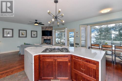 11617 Pretty Road, Lake Country, BC - Indoor Photo Showing Kitchen With Fireplace
