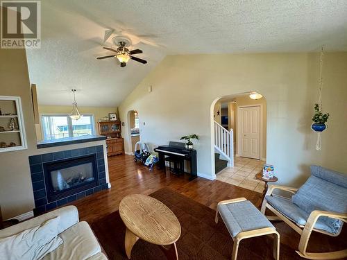 8705 19A Street, Dawson Creek, BC - Indoor Photo Showing Living Room With Fireplace