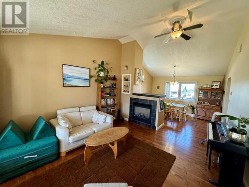 8705 19A Street, Dawson Creek, BC - Indoor Photo Showing Living Room With Fireplace