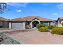 246 Pendragon Place, Kelowna, BC  - Outdoor With Facade 