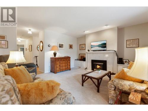 3146 Paris Street Unit# 104, Penticton, BC - Indoor Photo Showing Living Room With Fireplace