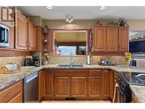 482 Clifton Road N, Kelowna, BC - Indoor Photo Showing Kitchen With Double Sink