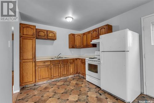 319-321 Carson Street, Dundurn, SK - Indoor Photo Showing Kitchen With Double Sink